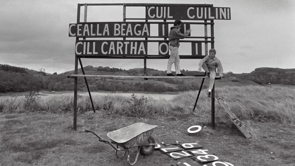 Young lads given the task of manning a scoreboard in Killybegs, back in the day. Messing, probably. Photograph: Billy Stickland/Inpho
