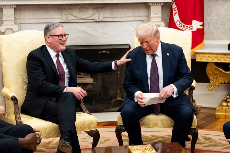Keir Starmer gives Donald Trump an invitation from King Charles for a state visit to the UK, at their meeting in the Oval Officelast month. Photograph: Doug Mills/New York Times
                      