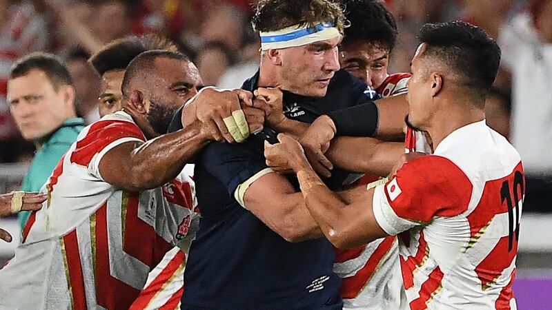 Scotland flanker Jamie Ritchie  confronts Japan outhalf Yu Tamura  during the side’s Rugby World Cup game in Yokohama. Photograph:  William West/AFP via Getty Images