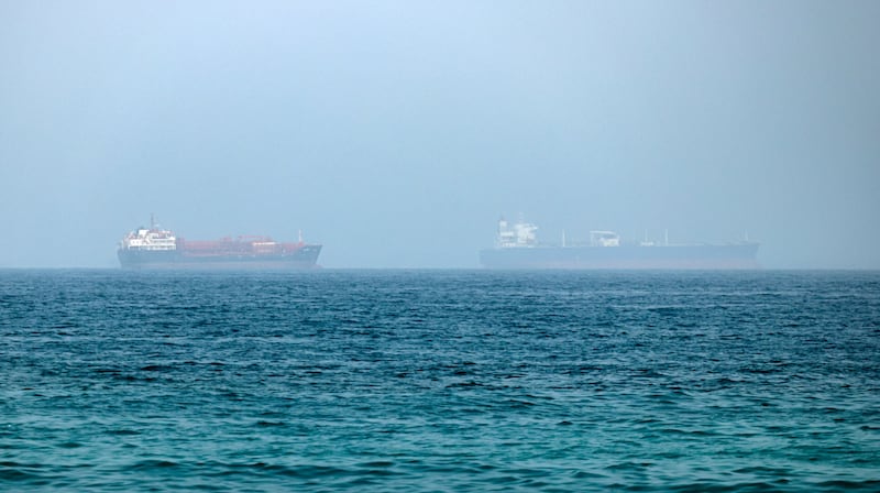 Cargo vessels are seen at one end of the Strait of Hormuz near the coast of Dibba Al Fujairah, United Arab Emirates, on Tuesday. Photograph: EPA