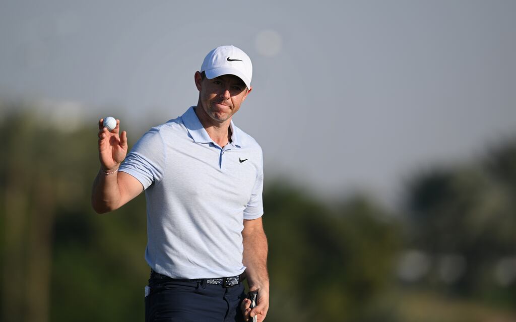 Rory McIlroy of Northern Ireland acknowledges the crowd after putting out on the 18th green in Dubai. Photograph: Alex Burstow/Getty