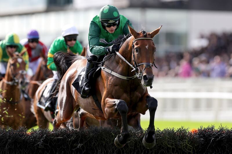 Danny Mullins takes a fence on Anotherway during the Guinness Galway Hurdle Handicap. Photograph: Laszlo Geczo/Inpho