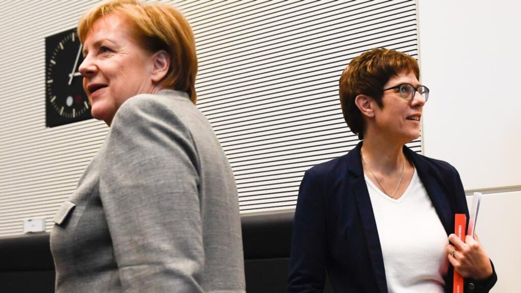 German chancellor Angela Merkel and Annegret Kramp-Karrenbauer (AKK): AKK, the new chair of the German Christian Democratic Union, has to put up with being tagged a mini-Merkel. Photograph: Filip Singer
