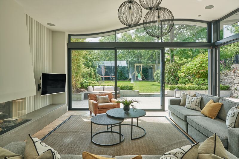 Sitting area with fireplace next to the kitchen