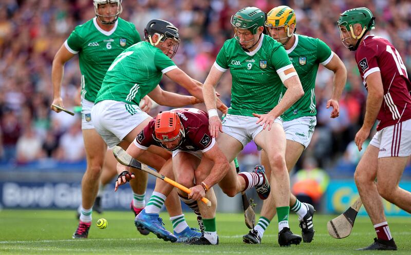 Limerick’s Gearoid Hegarty and William O'Donoghue move in to stop Conor Whelan of Galway. Photograph: Ryan Byrne/Inpho