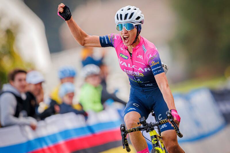  Fariba Hashimi celebrates as she crosses the finish line to win the 2022 women's road cycling championships of Afghanistan in Aigle, western Switzerland. Photograph: Valentin Flauraud/AFP/Getty Images 