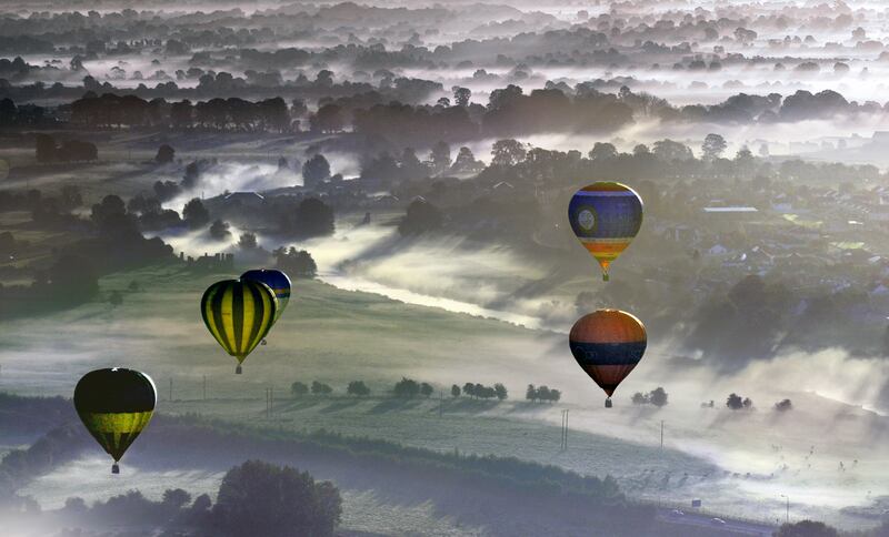 The Irish Hot Air Ballooning Championships taking place over Trim during early morning sunrise. Photograph: Brenda Fitzsimons