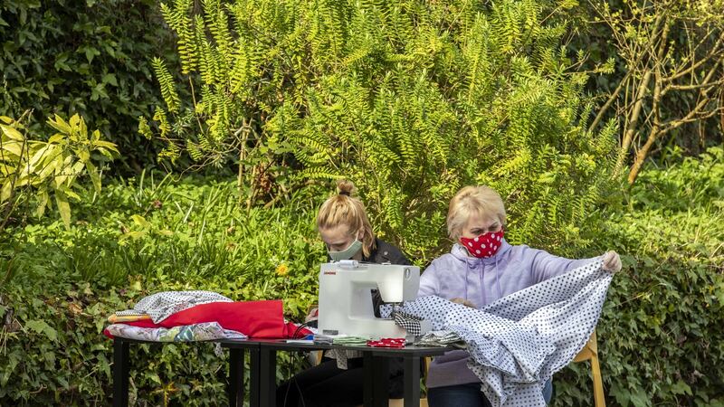 Olga Voytenko and her daughter Sofya Abashko are pictured working as part of the Sanctuary Mask Initiative  in The Cork Migrant Centre in the grounds of Nano Nagle Place, Cork City. Photograph: Clare Keogh.