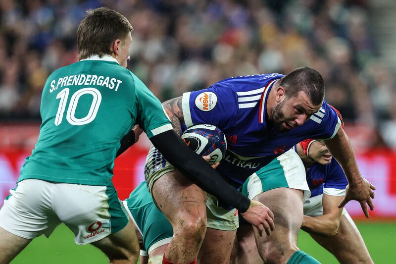 France's Dorian Aldegheri carries the ball past Sam Prendergast of Ireland during Thursday's Six Nations opener at Stade de France. Photograph: Ben Brady/Inpho