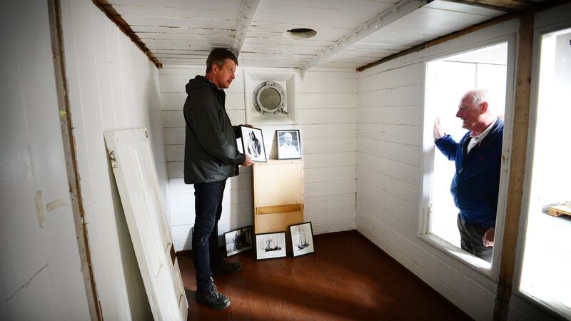 Joe O’Farrell (right) of the Shackleton Museum and Sven Habermann in the cabin of the  polar exploration steamship ‘Quest’ in which explorer Ernest Shackleton died  on January 5th, 1922.  Photograph: Bryan O’Brien /The Irish Times