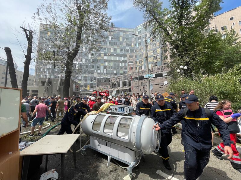 Medical equipment is moved away from the wreckage of Ohmatdyt hospital on Monday. Photograph: Dan McLaughlin