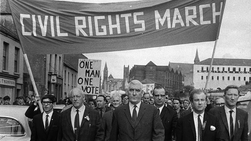 The  Derry civil rights parade moves off from Waterside railway station, heading towards Duke Street.