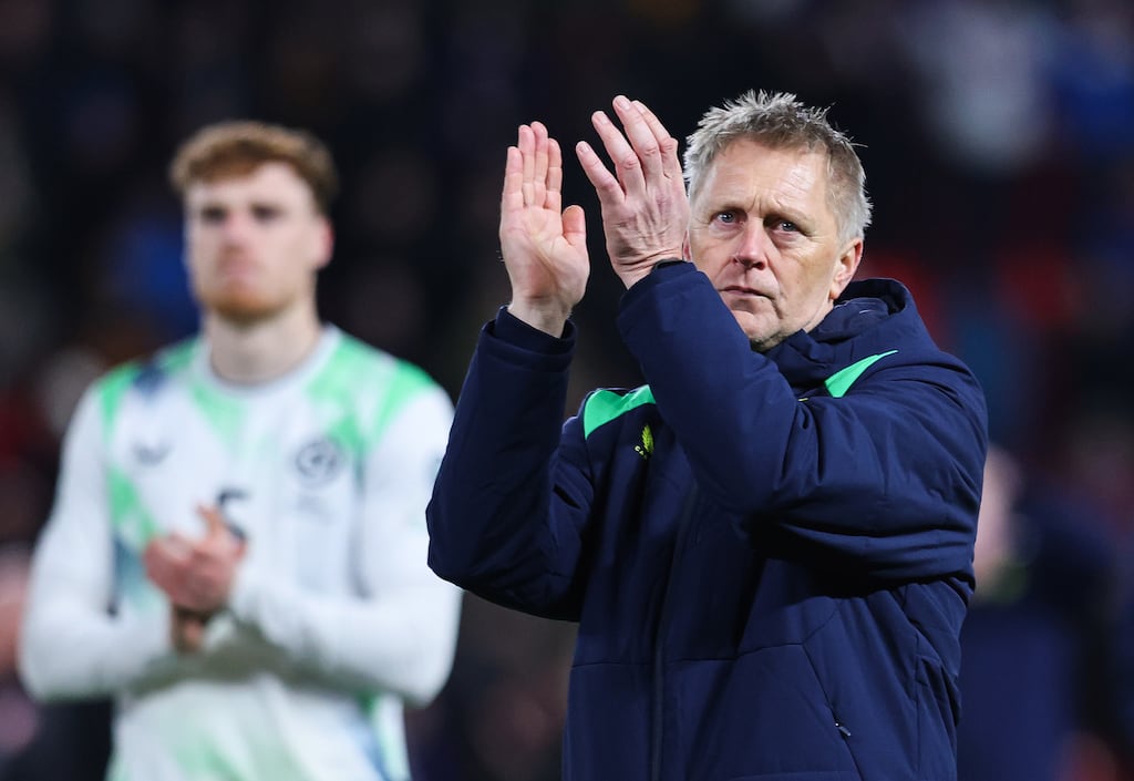 Republic of Ireland manager Heimir Hallgrímsson applauds fans after the game. Photograph: Ryan Byrne/Inpho
