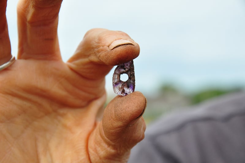 An amethyst pendant uncovered during University of Galway archaeological excavations. Photograph: Michelle Comber