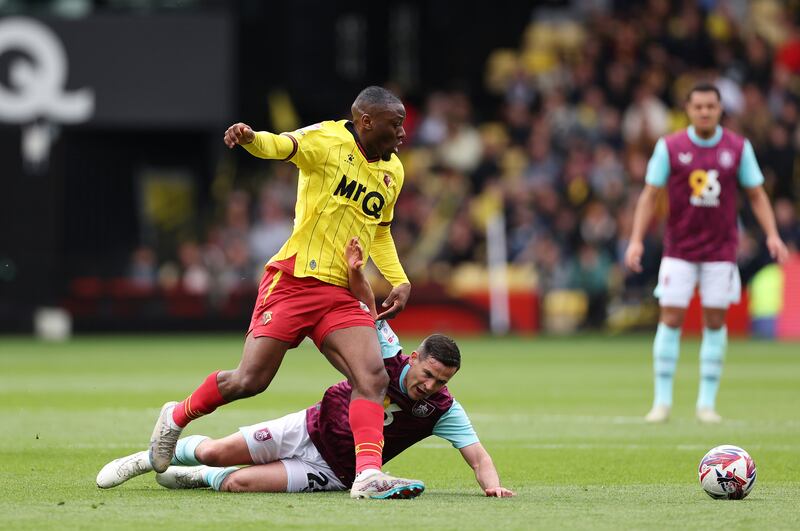 Edo Kayembe of Watford is challenged by Josh Cullen of Burnley. Photograph: Harry Murphy/Getty
