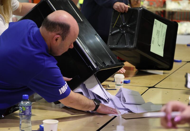 The first ballot boxes are opened at the start of counting in the Dublin Central byelection at Dublins RDS.Photogr aph: Alan Betson / The Irish Times


