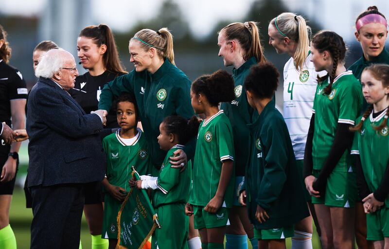 President Michael D Higgins greets Ireland's Diane Caldwell before the Women's Nations League match between Republic of Ireland and Albania in October. Photograph: Tom Maher/Inpho