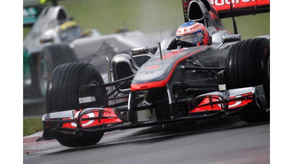 Jenson Button of McLaren drives on his way to winning the Canadian Grand Prix at the Circuit Gilles Villeneuve in Montreal. Photograph: Paul Gilham/Getty Images