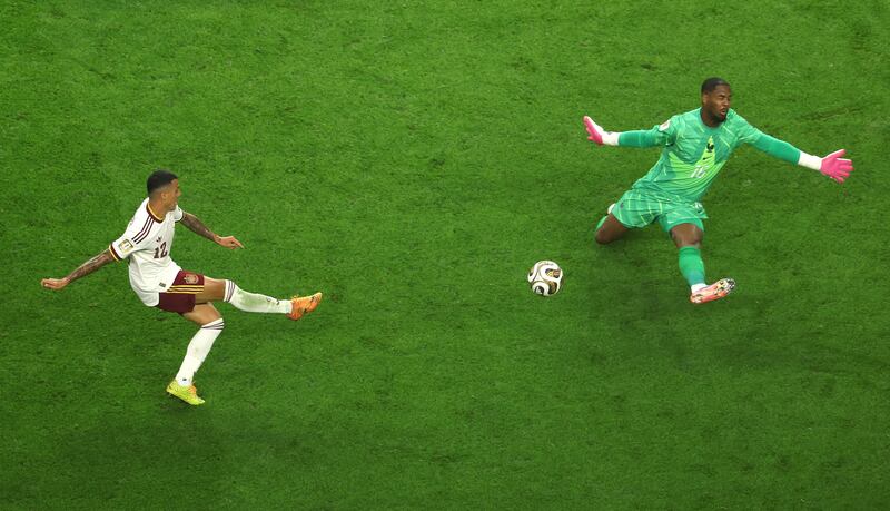 Pedro Porro scores Spain's second goal as he slots the ball past Mike Maignan of France. Photograph: Stacy Revere/Getty Images