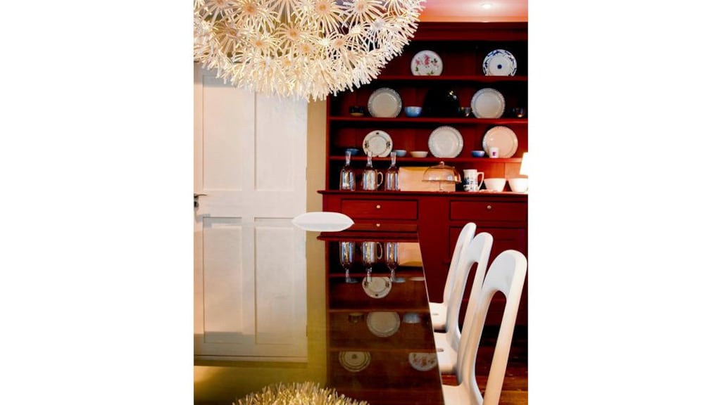 CREATIVE COCOON (clockwise from above left): Pat McCarthy at the entrance to Ballilogue Clochán; the sittingroom; dining room; garden. PHOTOGRAPHS: MARK McCALL