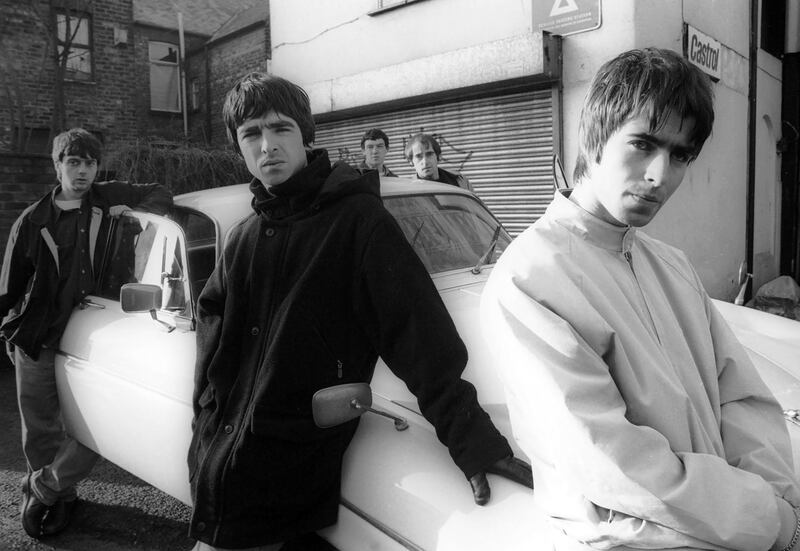Oasis in Withington, Manchester, in 1993: Paul McGuigan, Noel Gallagher, Tony McCarroll, Liam Gallagher, Paul Arthurs (aka Bonehead). Photograph: James Fry/ Getty Images