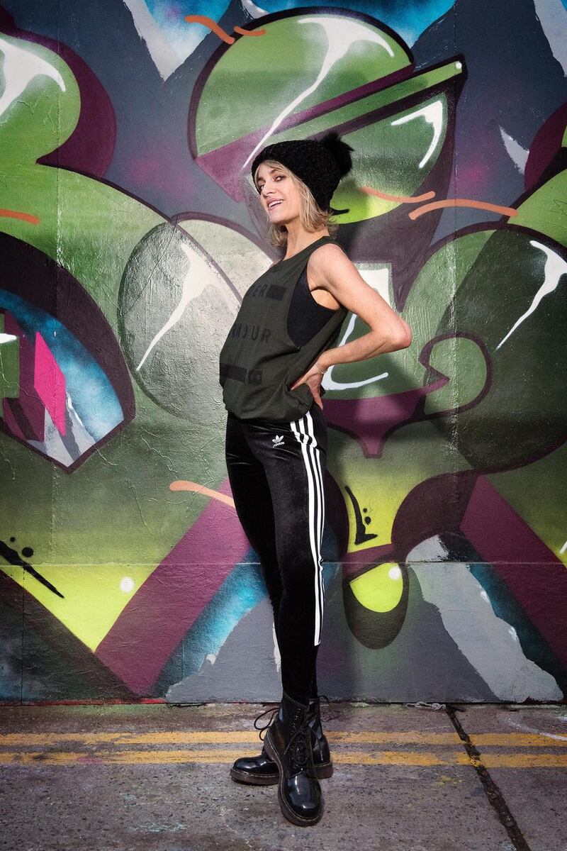 “I love to wear a second layer over tight leggings going to and from classes” says Shortall. Black velvet leggings  by Adidas €45; green Armour tank top €30. Both from JD Sports.