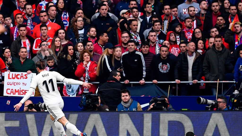 Real Madrid’s Gareth Bale celebrates after scoring his side’s third goal in their LaLiga win over Atletico Madrid. Photo: Gabriel Bouys/Getty Images