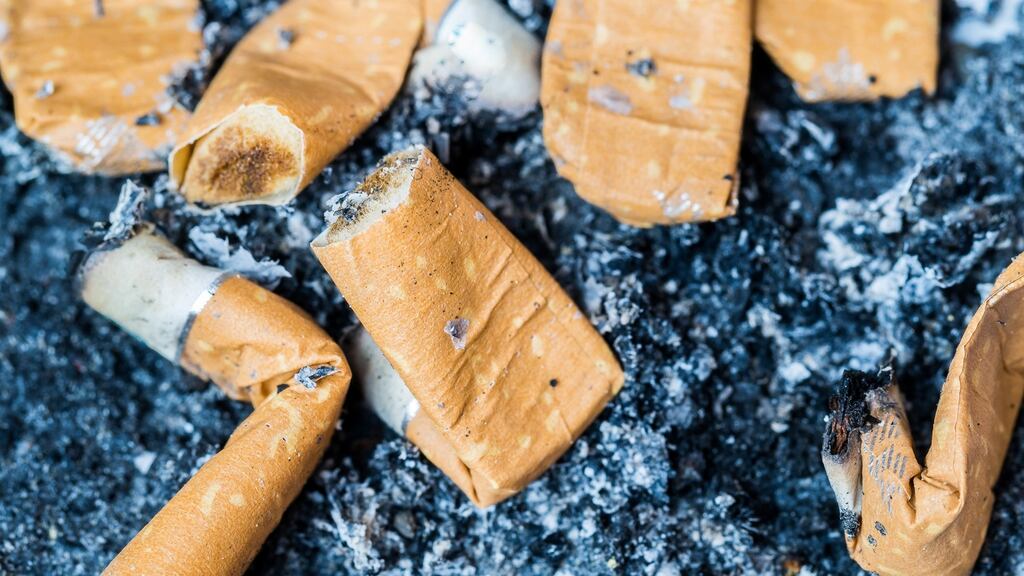 Cigarette butts: Thousands of tonnes of toxic waste is flicked onto pavements every day.