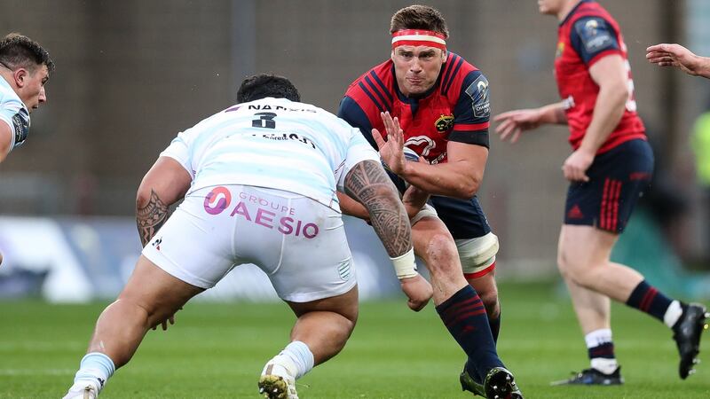 Munster’s CJ Stander runs into the challenge of Racing’s  Ben Tameifuna during the Champions Cup game at Thomond Park. Photograph: Billy Stickland/Inpho