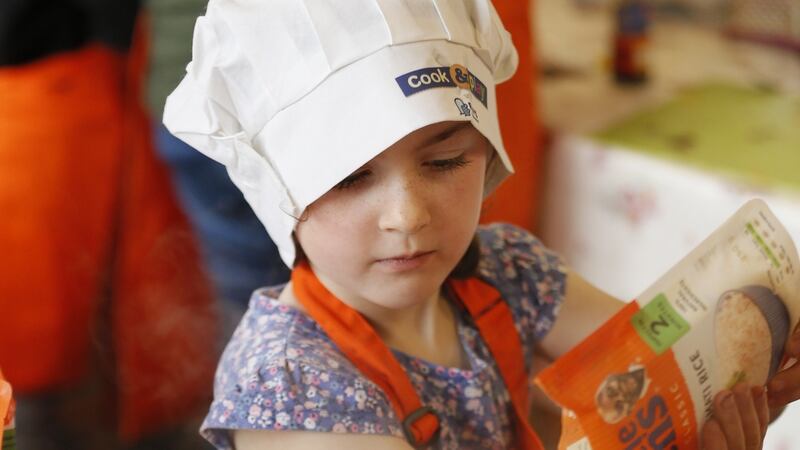 Eve Cullen takes on the chef’s role  at the Ben’s Beginner’s Cook and Play session at Airfield, Co Dublin. Photograph: Kieran Harnett