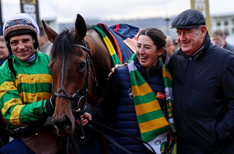 JP McManus (right) with The New Lion, jockey Harry Skelton and groom Backs Coles after the horse won last year's Turner's Novices' Hurdle at Cheltenham. Photograph: Tom Maher/Inpho
