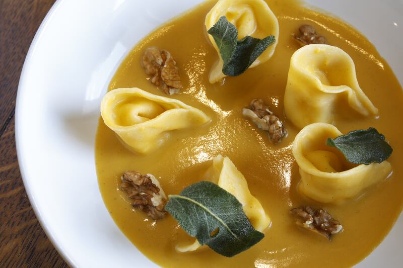 Fried sage leaves add aromatics to the squash sauce. Photograph: Nick Bradshaw