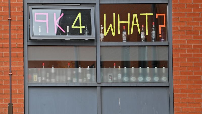 Students in temporary lockdown at Manchester Metropolitan University in England pose their own philosophical question. Photograph: Paul Ellis/AFP via Getty Images