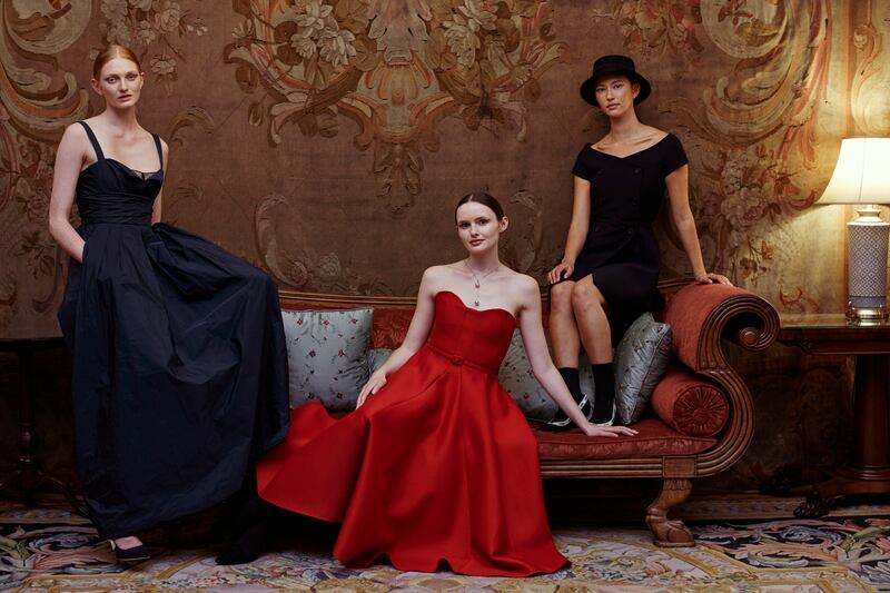 Dresses by Christian Dior: navy taffeta gown, red belted gown and wool mini-dress