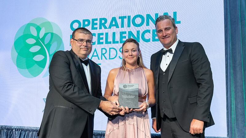 Alessandro Laureani, awards judge, presents the operational excellence in tourism & leisure award to Erin O'Brien and Liam O'Brien, Doolin Ferry