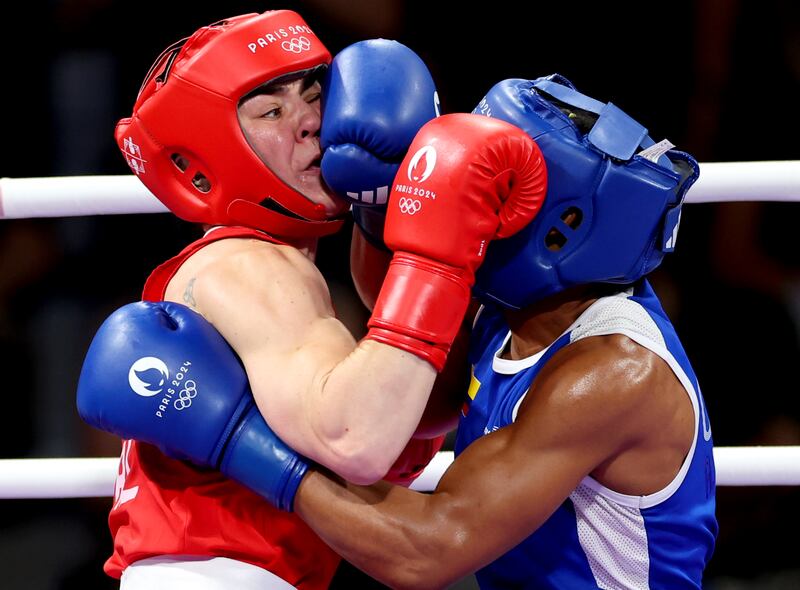 Kellie Harrington (red) in action against Angie Paola Valdes Pana. Photograph: James Crombie/Inpho