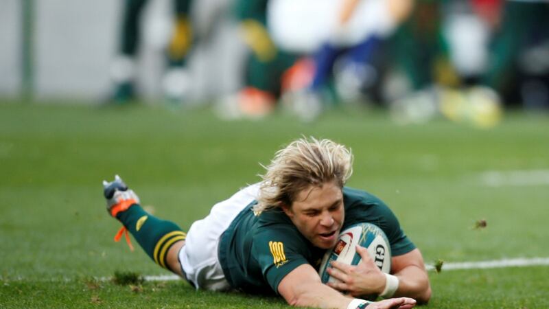 South Africa’s Faf de Klerk scores a try. Photograph: Reuters/Siphiwe Sibeko