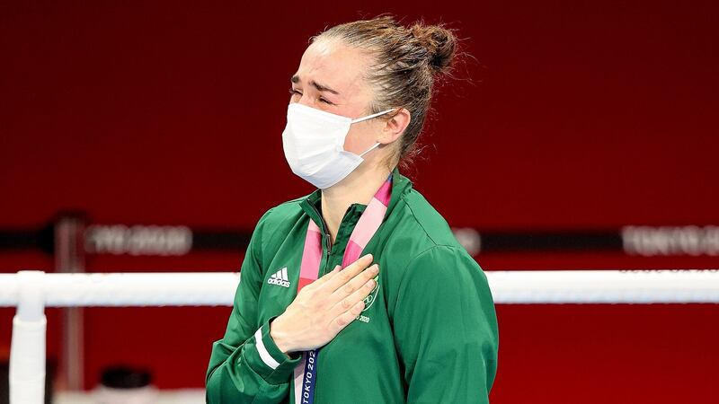 Kellie Harrington during the playing of  Amhrán na bhFiann at the Kokugikan Arena in  Tokyo following her gold medal win. Photograph: Bryan Keane/Inpho