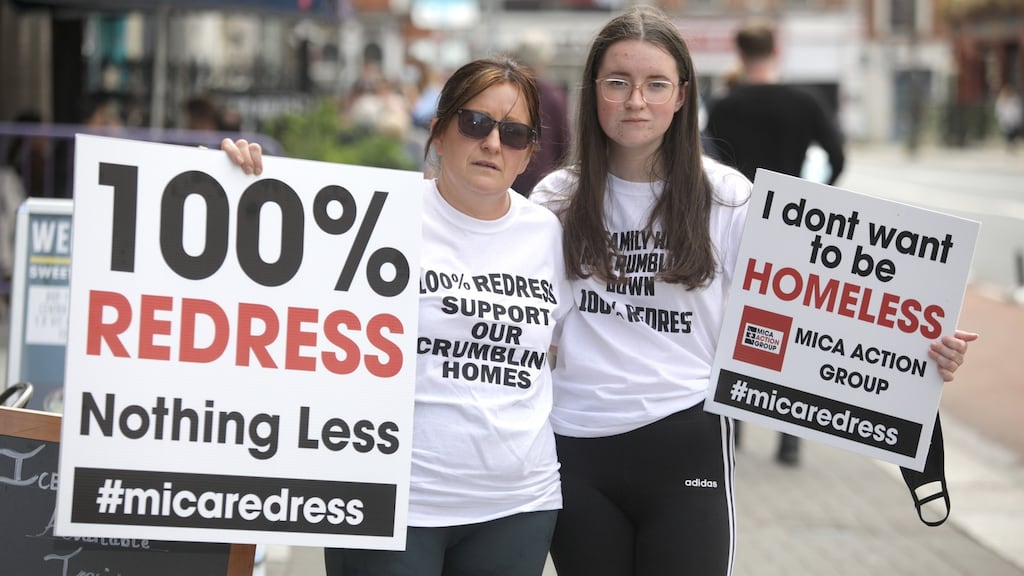 Sharon Doneghy (left) with her daughter Chloe from Buncrana, Co Donegal who are part of a protest in Dublin today by homeowners who properties have been damaged by mica or pyrite. Photograph: Photograph: