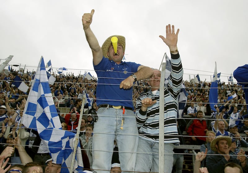Fans celebrate at the Munster Hurling Final in 2002. Photograph: ©INPHO/Patrick Bolger