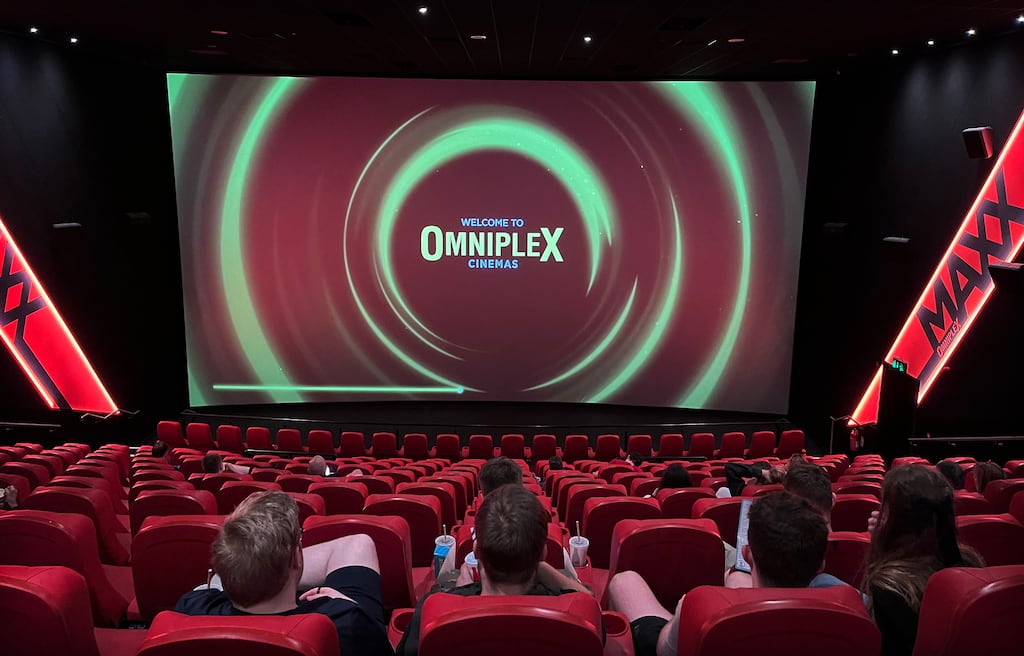 The Omniplex Cinema Group is expanding into Britain with the acquisition of five Empire Cinema sites