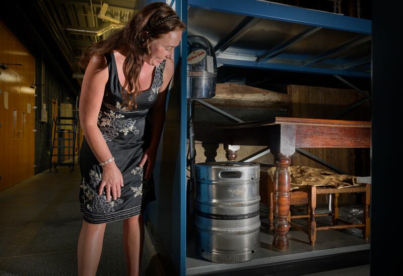 Clodagh Doyle, keeper of the Irish folklore collection at the National Museum of Ireland - Country Life, inspecting some items from the new Covid-19 pandemic collection. Photograph: Michael McLaughlin