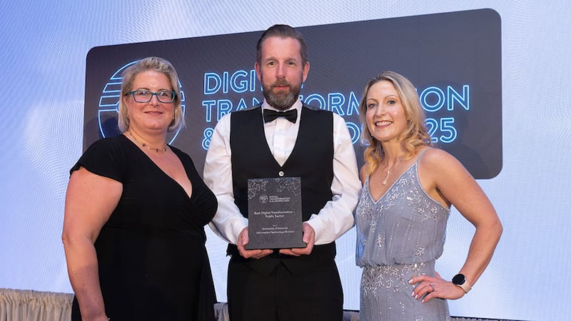 Maria Svejdar, award judging coordinator, presents the best digital transformation - public sector to Mark Twomey and Treasa Cunneen, University of Limerick