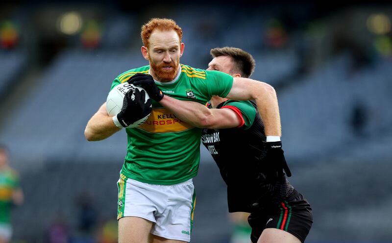 Conor Glass forces his way past St Brigid's Shane Cunnane while helping Glen to victory in January's All-Ireland final. Photograph: Ryan Byrne/Inpho