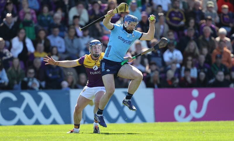 Wexford's Conor Hearne and Conor Burke of Dublin during round one of Leinster's Senior Hurling Championship. Photograph: Bryan Keane/Inpho