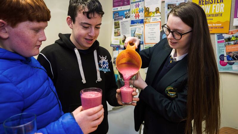 (L to R) Fionnian Gill (12), Eoin Mulhern (13) and Niamh McGrath (17)  at Buncrana Foróige Club. Photograph: Bernard Ward for The Irish Times