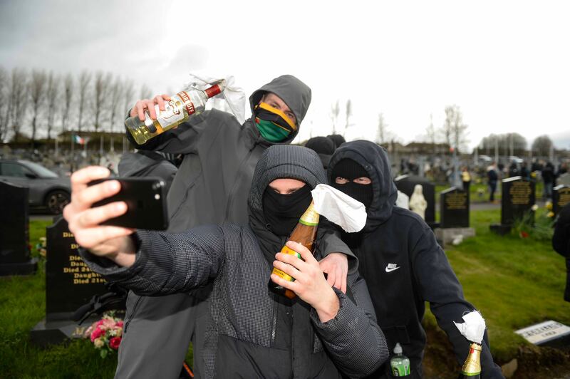 People take part in a dissident republican parade that on Monday travelled from the Creggan shops in Derry to the city cemetery. Photograph: Mark Marlow/PA Wire 