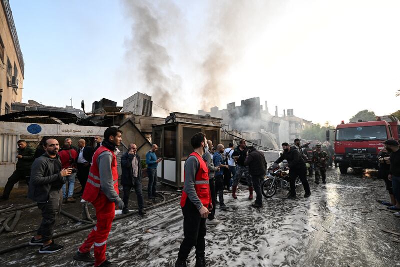 People check the damage following a reported Israeli strike in the Mazzeh district of Damascus on Thursday. Photograph: Louai Beshara/AFP via Getty