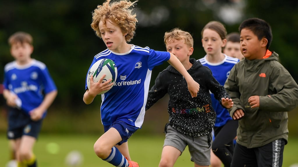 Shane Buggy, aged 10, in action during a Bank of Ireland Leinster Rugby Summer Camp at Clondalkin RFC in Dublin. Only outdoor summer camps are permitted due to Covid restrictions. Photograph: Matt Browne/ Sportsfile