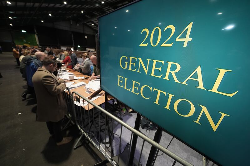 All heads down at the  RDS Simmonscourt. The tallies are flying in from all over the country but it will be hours yet before we have any results. Photograph: Brian Lawless/PA Wire